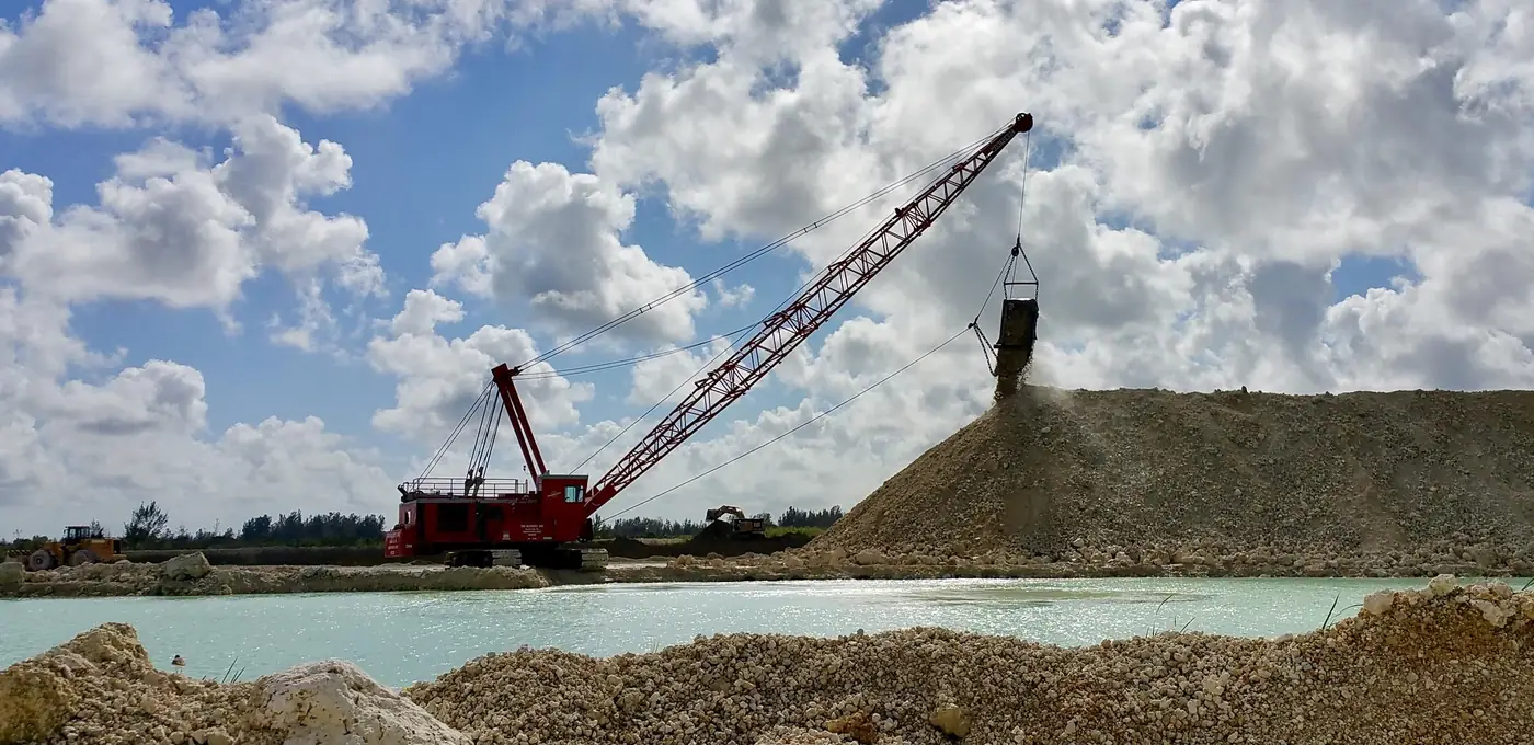 Dragline excavating limestone aggregate from a Florida quarry lake